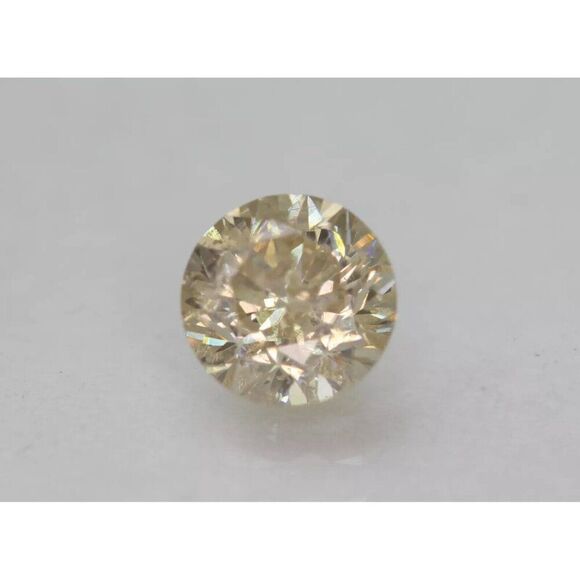 0.67 Carat Brown Yellow Round Brilliant Enhanced Natural Diamond 5.35mm - Picture 1 of 3